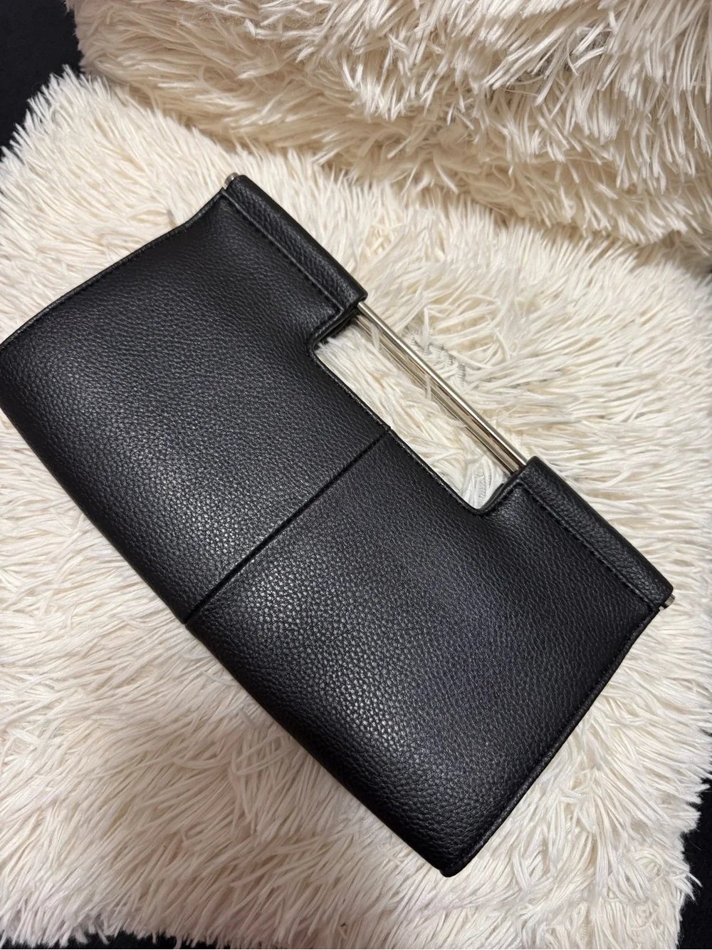 The Limited Black Textured Leatherette Clutch with Metal Handle
